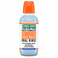 TheraBreath Fresh Breath Whitening Oral Rinse bottle in Dazzling Mint flavor, featuring a white bottle filled with blue glitter, an orange cap, and a white label with green and orange text.