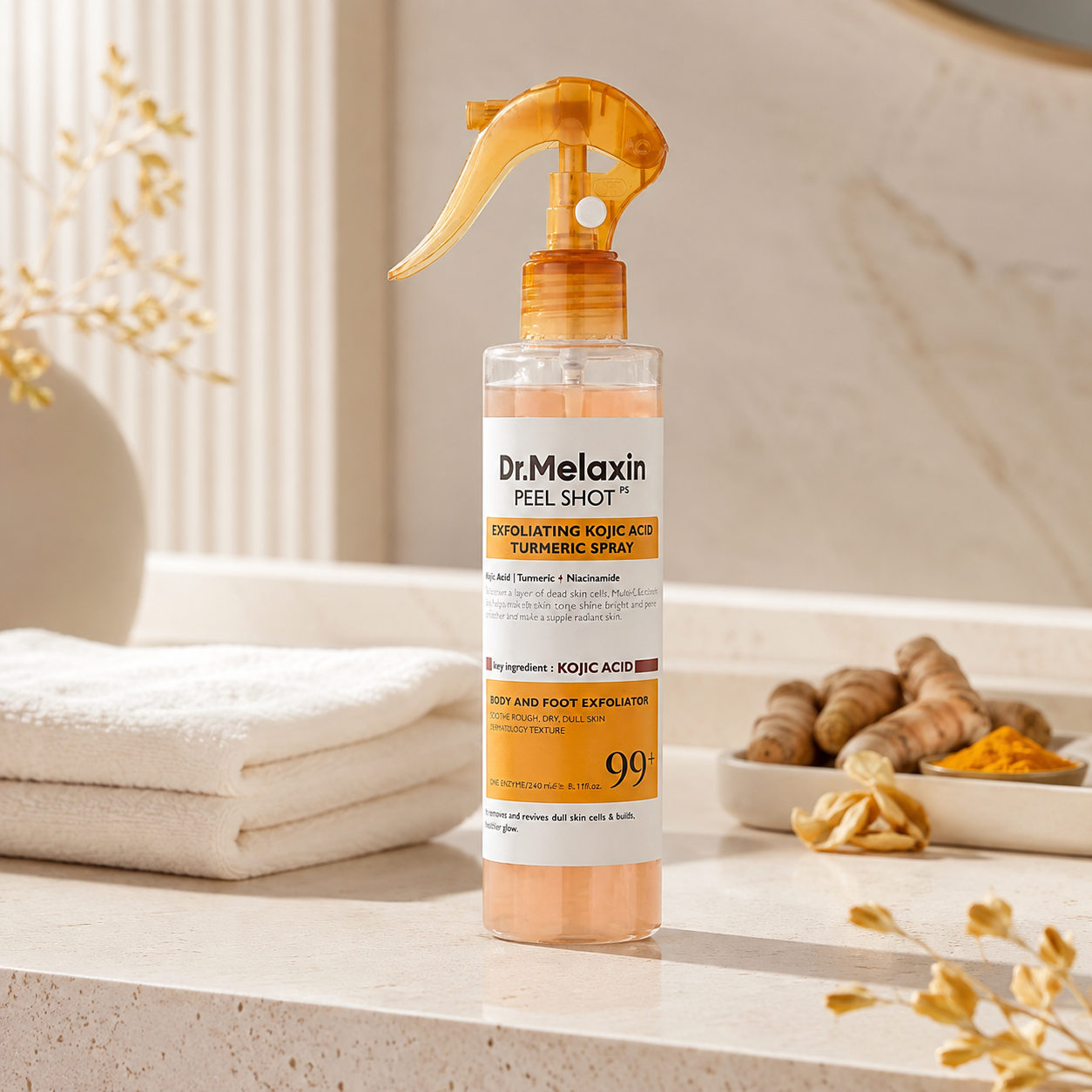 A bottle of Dr. Melaxin Peel Shot Turmeric Spray stands on a bathroom counter next to folded white towels, turmeric roots, and dried flowers.